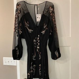 Free people size small black embroidered dress never been worn